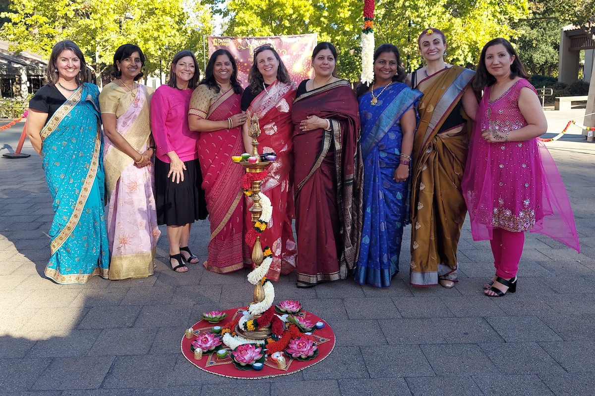 line of women in saris