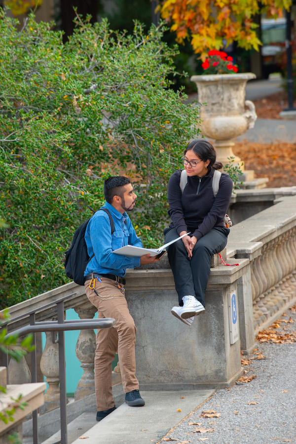 students talking outside