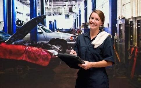woman in auto garage